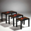 Gaston SUISSE (1896-1988) - Suite de trois tables gigognes en laque noire, circa 1936.